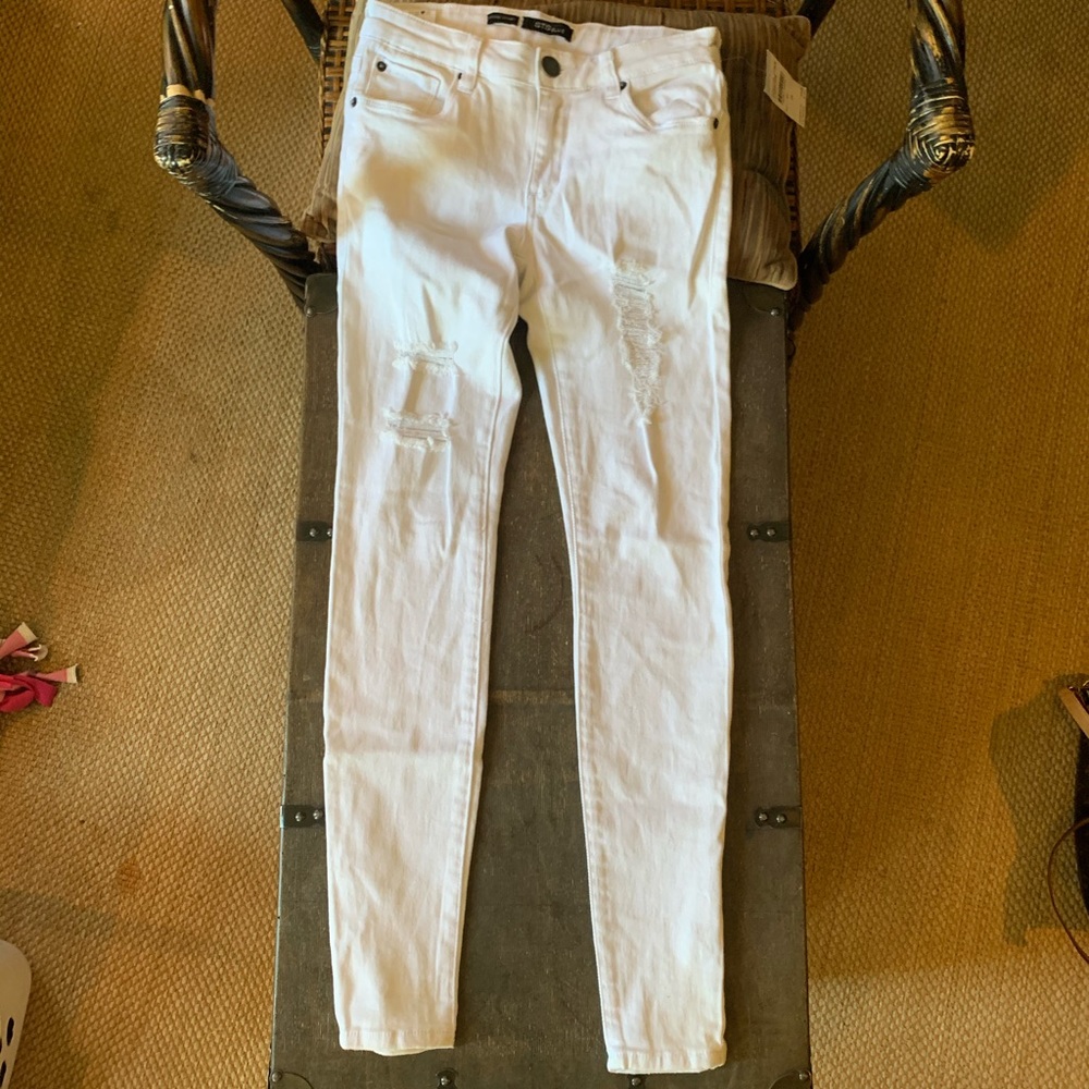 White ripped skinny jeans.